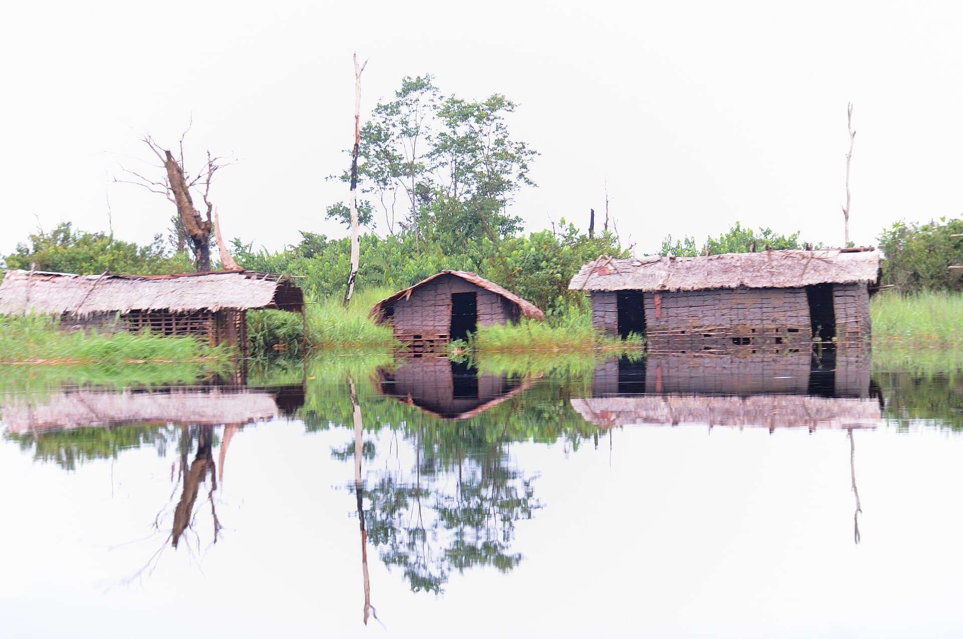 File photograph: File photo: flooded houses on the Likouala-aux-Herbes River, which runs through Epéna, during the rainy season in 2018.