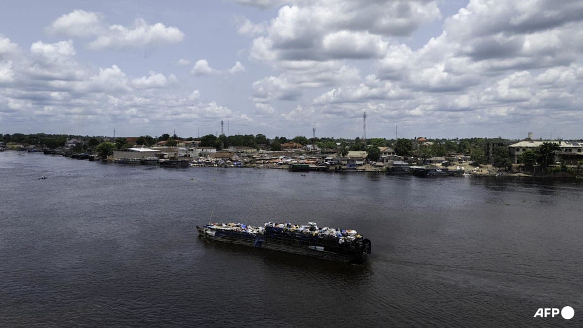 File photograph: A boat loaded with passengers and goods on the Congo River.