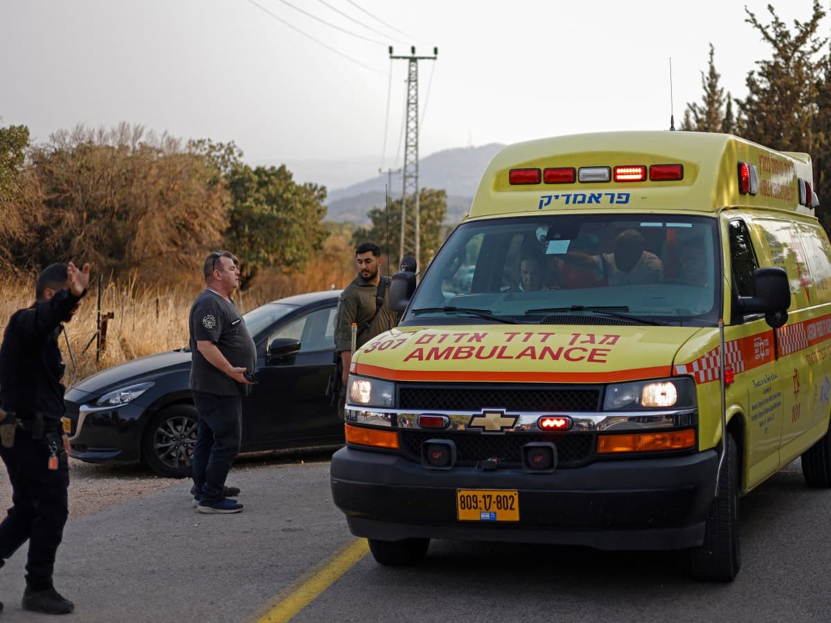 An ambulance arrives near the site of the explosion in northern Israel on 12 October.
