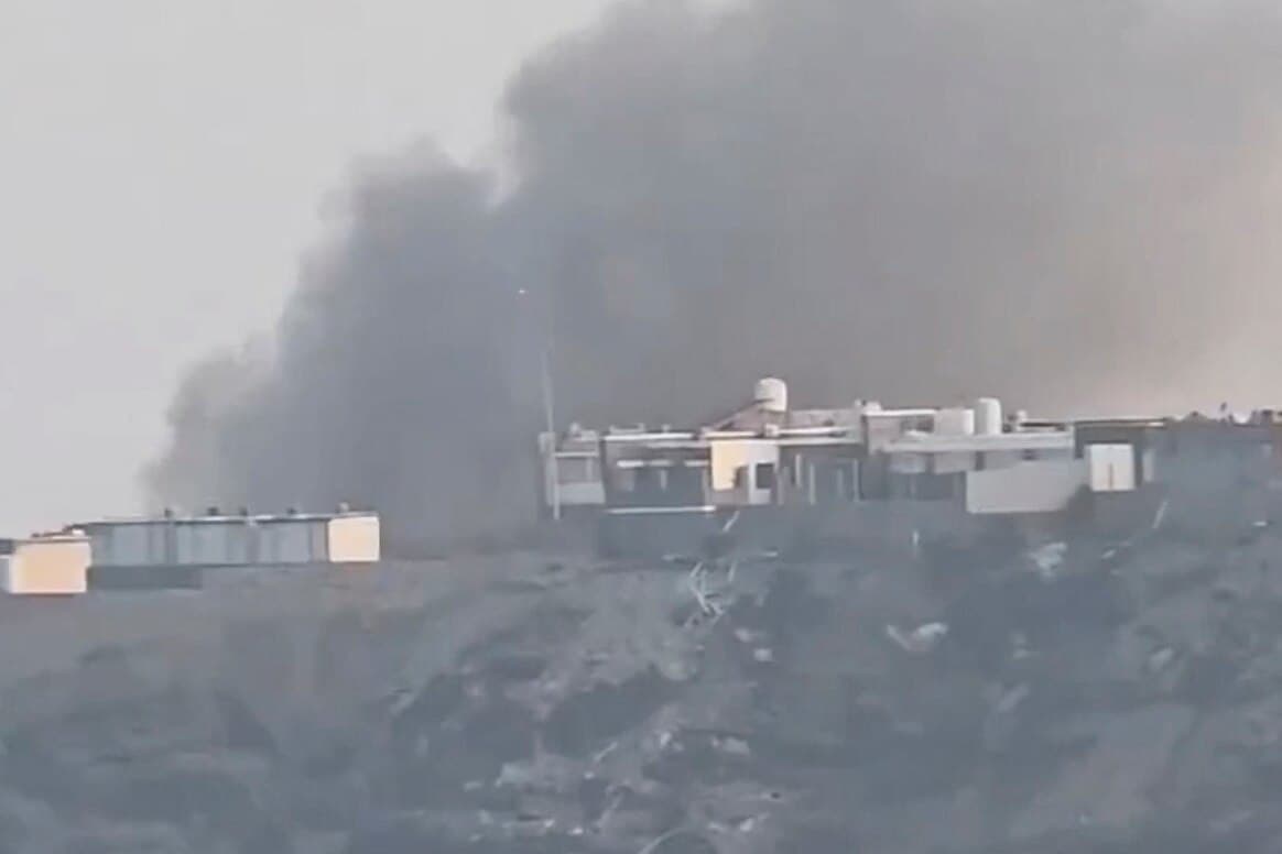Smoke billows from the presidential palace complex in Aden following the attack.
