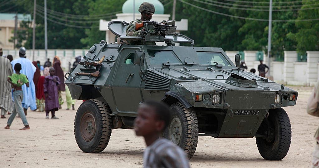File photograph: File photo: Nigerian soldiers in an armoured vehicle in Maiduguri, Borno state, in August 2013.