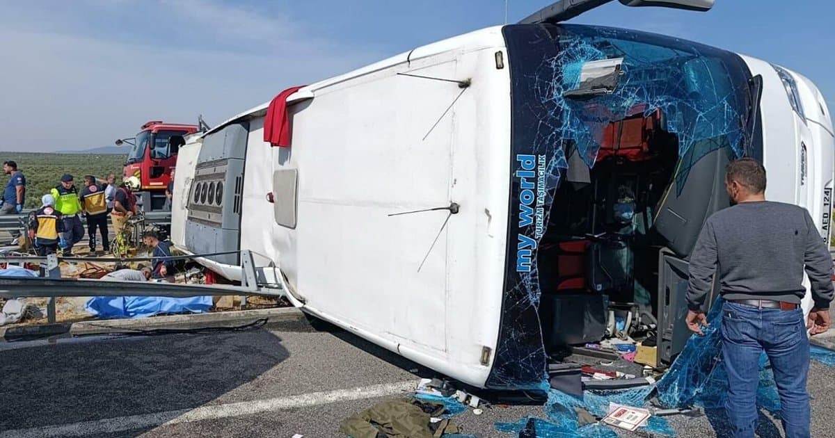 Fire and first aid officials work at the site where a coach collided with a truck in Manisa, western Türkiye, on 11 October.