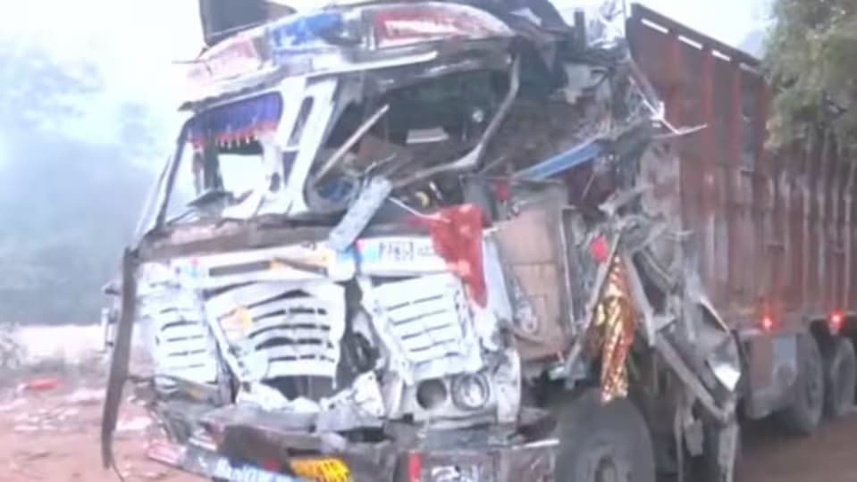 The wrecked truck after it ploughed into worshippers outside a temple in Gwalior, India, on 18 October.